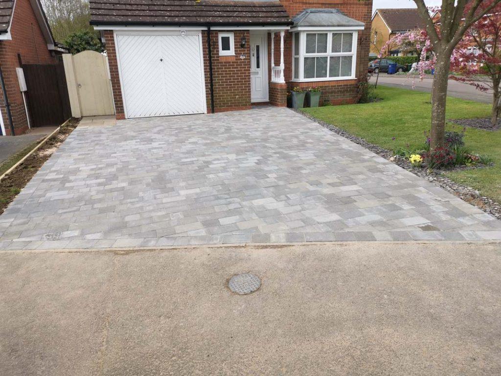 pavement with paved driveway